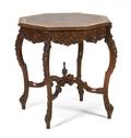 A Continental Carved Wood Occasional Table
