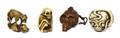 A Group of Four Netsuke of Skeletons