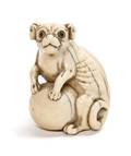 An Ivory Netsuke of a Dog