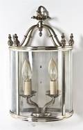A Silvered Metal TwoLight Sconce