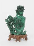 A Carved Malachite Lidded Vase with Peonies