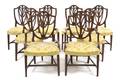 A Set of Eight American Hepplewhite Style Dining Chairs