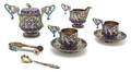 A Russian Silver and Enameled Service for Two