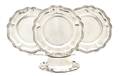 A Set of Twelve Peruvian Silver Butter Plates