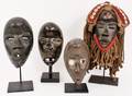 Group of Four 20th Century African Masks