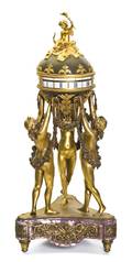 A French Gilt and Patinated Bronze Figural Annular Clock