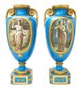 A Pair of Sevres Style Porcelain Urns