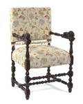 A Renaissance Revival Style Carved Open Armchair