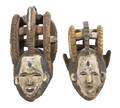 Two African Carved and Polychrome Decorated Masks