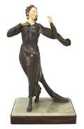An Art Deco Cast Metal and Composite Figure Menneville