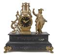 A French Cast Metal and Slate Figural Mantel Clock