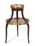 A Louis XVI Style Gilt Metal Mounted TwoTiered Side Table