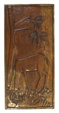 A Carved Wood Relief Plaque