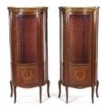 A Pair of Louis XVI Style Gilt Metal Mounted and Marquetry Decorated Vitrines