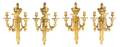 A Set of Four Louis XVI Gilt Bronze ThreeLight Sconces