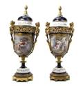 A Pair of Gilt Bronze Mounted Sevres Style Covered Urns