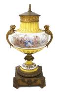 A Sevres Style Porcelain and Gilt Bronze Mounted Urn