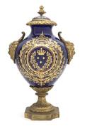 A Sevres Style Porcelain and Gilt Metal Mounted Urn