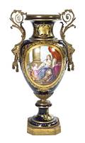 A Sevres Style Gilt Bronze Mounted Porcelain Urn