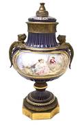 A Sevres Style Gilt Bronze Mounted Urn