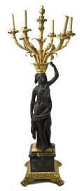 An Empire Style Gilt and Patinated Bronze SixLight Candelabrum