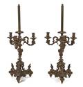 A Pair of Neoclassical Bronze ThreeLight Candelabra