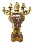 A Continental Gilt Bronze and Rouge Marble SixLight Candelabrum