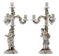 A Pair of Continental Figural FourLight Candelabra