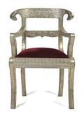 An Indian Silvered Metal Veneered Open Armchair