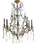 A Continental Bronze NineLight Chandelier