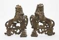 A Pair of Cast Iron Andirons