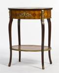 A Louis XVI Style Gilt Metal Mounted Occasional Table