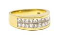 An 18 Karat Yellow Gold and Diamond Ring
