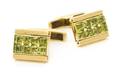 A Pair of 18 Karat Yellow Gold and Peridot Convertible Cufflinks