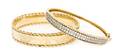 A Group of 14 Karat Yellow Gold Bangle Bracelets