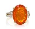 A 14 Karat Yellow Gold Fire Opal and Diamond Ring