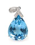 A 14 Karat White Gold Blue Topaz and Diamond Pendant