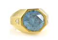 An 18 Karat Yellow Gold Blue Zircon and Diamond Ring