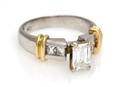 A Platinum 18 Karat Yellow Gold and Diamond Ring
