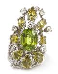 A Platinum Peridot Yellow Sapphire and Diamond Ring