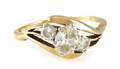 A 14 Karat Yellow Gold and Diamond Ring