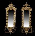 130 Pair of Brass Mirrored Two Light Sconces
