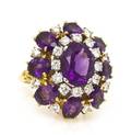 An 18 Karat Yellow Gold Amethyst and Diamond Ring