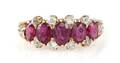A 14 Karat Yellow Gold Ruby and Diamond Ring