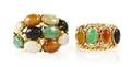 A Group of 14 Karat Yellow Gold and Jade Rings