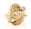 A 14 Karat Yellow Gold and Diamond Ring