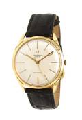 A 14 Karat Yellow Gold Automatic Wristwatch Universal Geneve