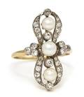 An Edwardian Platinum Topped Gold Pearl and Diamond Ring