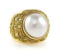 A 14 Karat Yellow Gold and Mabe Pearl Ring