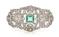 A Platinum Emerald and Diamond Brooch